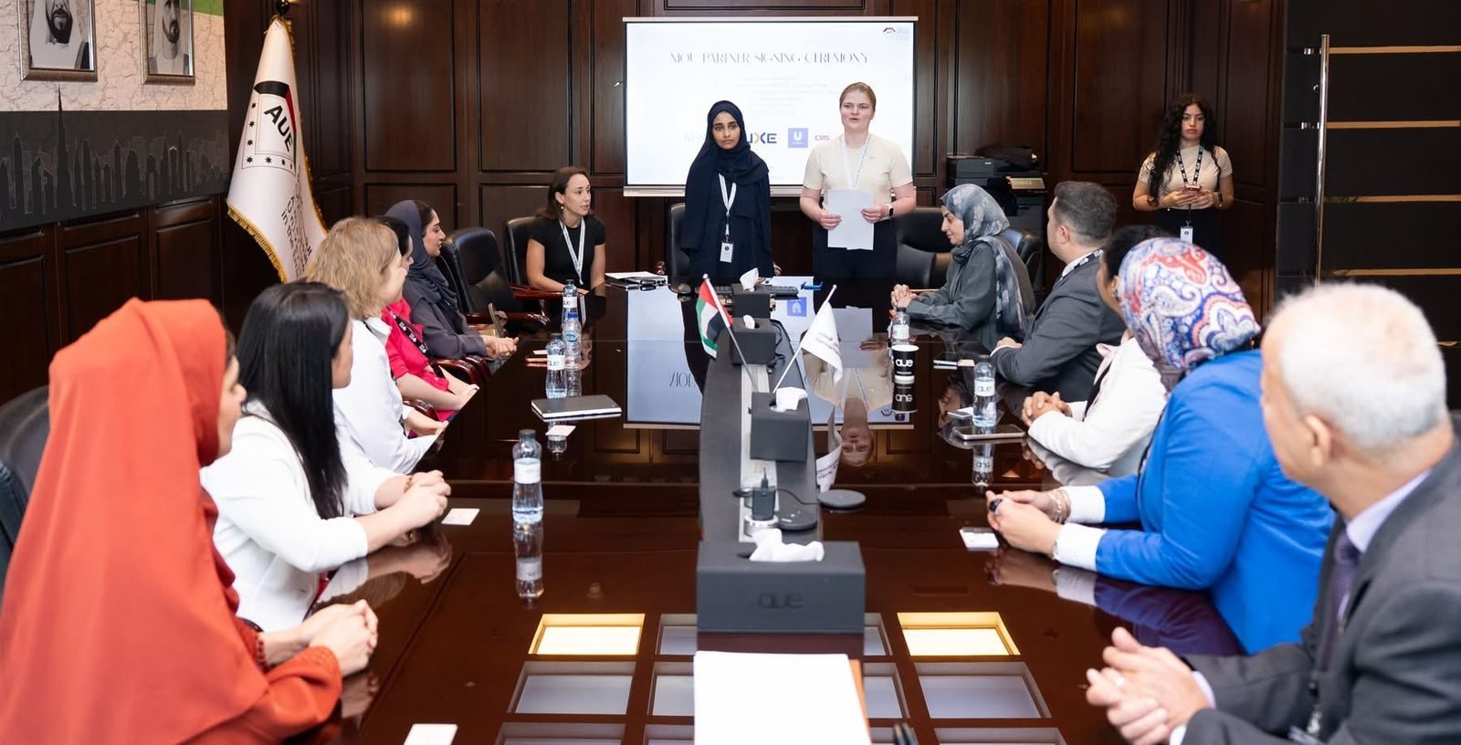 MoU Partner Signing Ceremony presentation at AUE boardroom